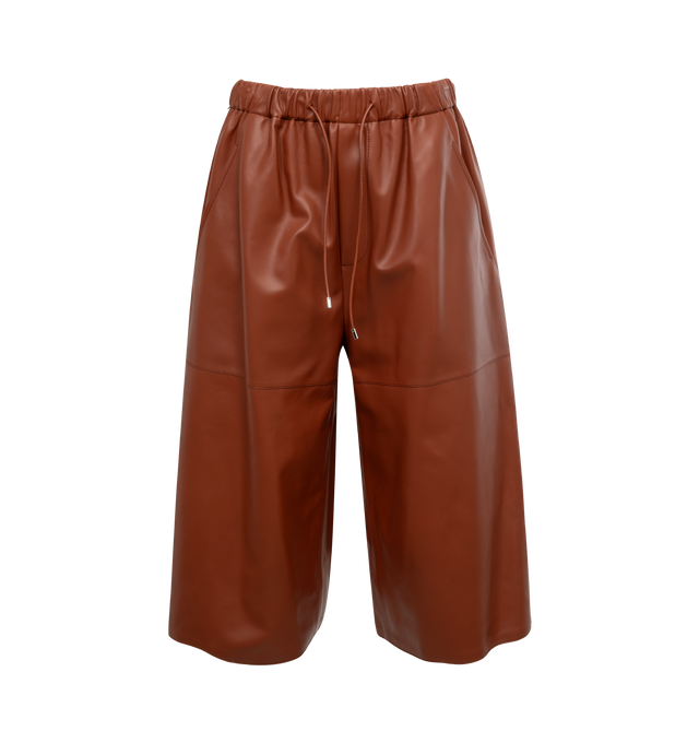 BROWN - LOEWE Cropped Trousers featuring relaxed fit, mid waist, wide leg, cropped length, elasticated waist, side pockets, half lined and Anagram embossed patch pocket placed at the back. Leather. Made in Spain.