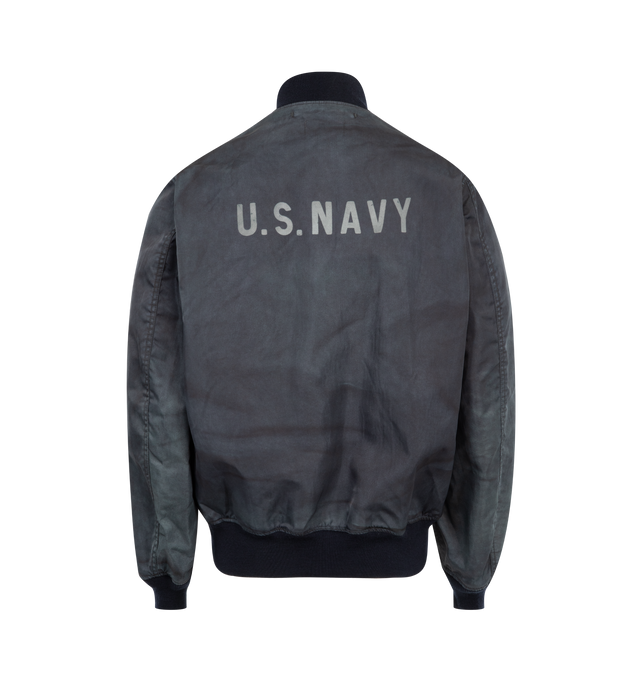 Image 2 of 3 - NAVY - JUNYA WATANABE US Navy Bomber featuring ribbed stand-up collar, long sleeves, ribbed cuffs and hem, hidden front closure with toggles, two side pockets, US Navy print on the back and straight hem. 100% nylon. 