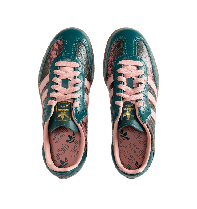 Image 5 of 5 - GREEN - Adidas Women's Samba OG Shoes reinterpret the brands iconic soccer-inspired silhouette with premium leather construction and heritage detailing. Designed with a lace-up closure and the signature elongated tongue, this updated version pairs classic Samba styling with modern versatility. Metallic Samba branding and Trefoil detailing celebrate the legacy of adidas Originals, while the durable rubber outsole provides reliable traction for everyday wear. Main Material: Leather. Closure: La 