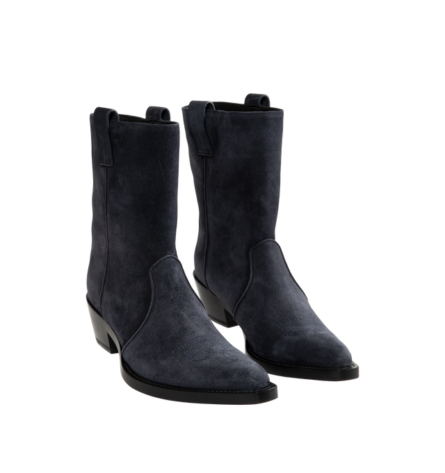 Image 2 of 4 - NAVY - Khaite Women's Clive Ankle Boots are crafted from hand-worked split-suede calfskin in midnight navy. Inspired by Western styles, the ankle-high silhouette features a snipped toe, deliberately tilted shaft, stitched welt, and stacked patinated-leather heel. Upper: 100% Calfskin. Sole: 100% Calfskin. Heel Height: 3.5 cm / 1.4 in. Made in Italy. 