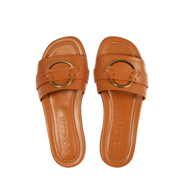 Image 4 of 4 - BROWN - MONCLER Bell Slide Shoes featuring leather upper, slip on and gold-colored metal logo ring detail. 100% leather. 