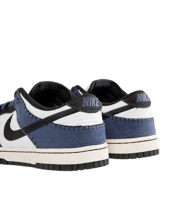 Image 3 of 5 - BLUE - NIKE Dunk Low Retro SE Sneaker featuring leather and suede upper with stitched overlays, foam midsole offers lightweight, responsive cushioning and rubber outsole with classic pivot circle. 