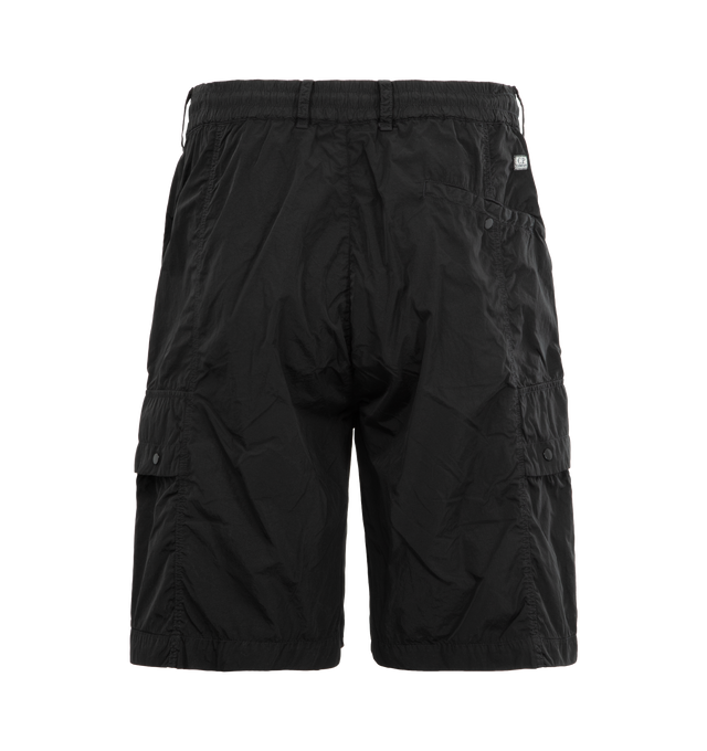 Image 2 of 3 - BLACK - C.P. COMPANY Chrome-R Lens Boxy Cargo Shorts featuring adjustable drawstring waistband, button and zip fastening, belt loops, side pockets, cargo flap snap pockets with Lens detail, back snap pocket, back applied logo label, garment dyed and boxy fit. 100% polyamide/nylon. 