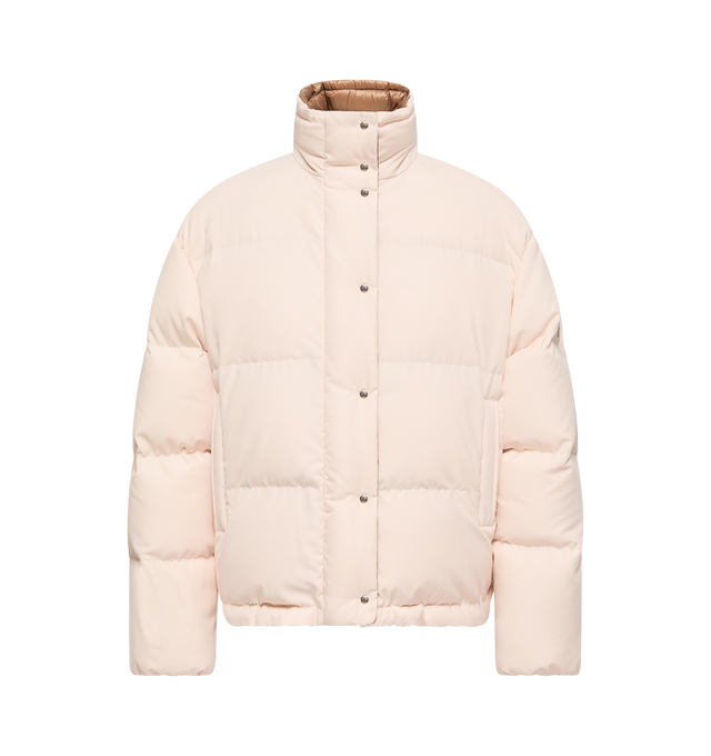 Image 1 of 1 - PINK - Moncler Women's Verone Down Jacket is crafted from lightweight micro cotton and features a loose-fit silhouette, down-filled insulation, a stand collar, and a front zip closure. Inspired by a Moncler icon, this updated design is finished with a pull-out hood for added versatility, internal suspenders that allow the jacket to be carried over the shoulders, zipped pockets, and a drawstring hem for an adjustable fit. A vintage-inspired metal logo references the brand's alpine heritage. Ma 