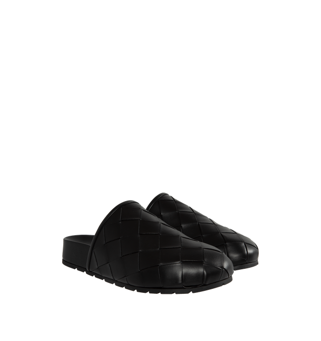 Image 2 of 4 - BLACK - BOTTEGA VENETA Reggie Woven Leather Mule Clogs featuring signature woven intreccio leather, flat heel, round toe, easy slide style and rubber outsole. Lining: leather. Made in Italy. 
