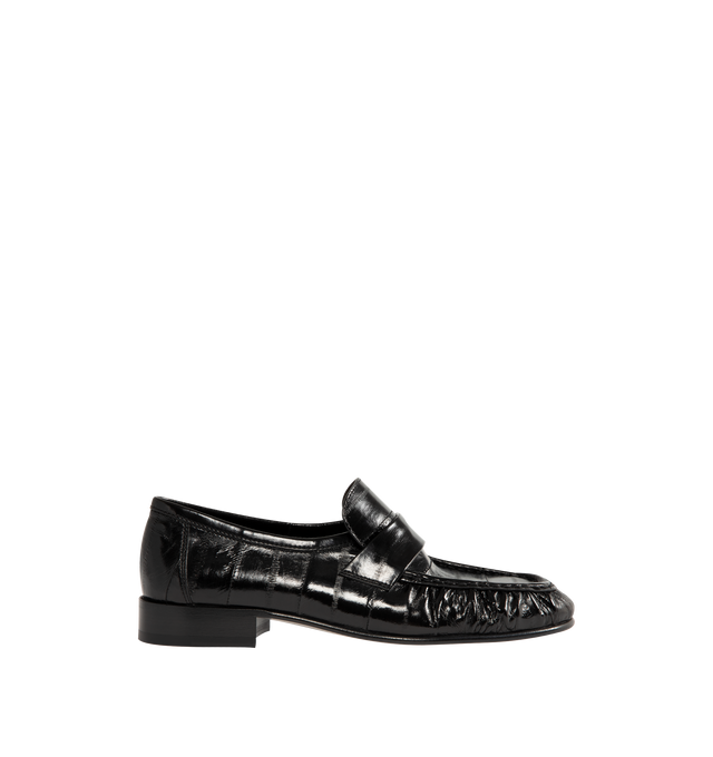 Image 1 of 4 - BLACK - THE ROW Soft loafer artisanally-crafted in polished eel skin leather with pleated outer vamp, curved front strap, hand-painted leather sole and sueded leater lining.  0.75 in. heel. Made in Italy. 