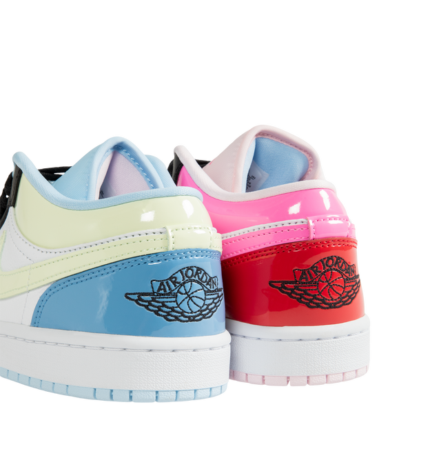 Image 3 of 5 - PINK - Air Jordan 1 Low SE Sneakers are crafted from leather and feature glossy patent accents with a playful mismatched color-block design that gives each shoe a unique look. Designed with a low-top silhouette, they are finished with Nike Swoosh branding, an embroidered Mini Swoosh at the lateral toe, Air Jordan Wings embroidery at the heels, perforated toe boxes, and durable rubber outsoles. Main Material: Leather. Sole: Rubber. Color: Multicolor. Made in womens sizing. 