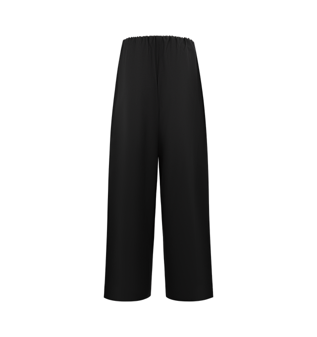 Image 2 of 3 - BLACK - TOTEME Drawstring Dinner Trousers featuring wide leg, tailored from fluid wool, an elasticated drawstring waistband that folds inward to create voluminous gathers and side pockets. 100% wool. 