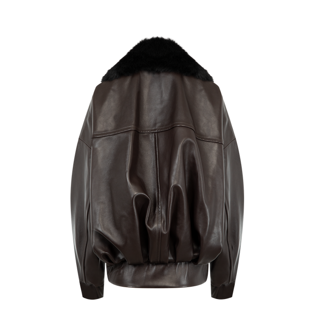 Image 2 of 3 - BROWN - KHAITE Daemon Jacket featuring lightweight lambskin, a silky collar of Toscana shearling, relaxed fit, zip-front closure, signature hardware, blouson pockets and elasticated back hem. 100% lambskin.  