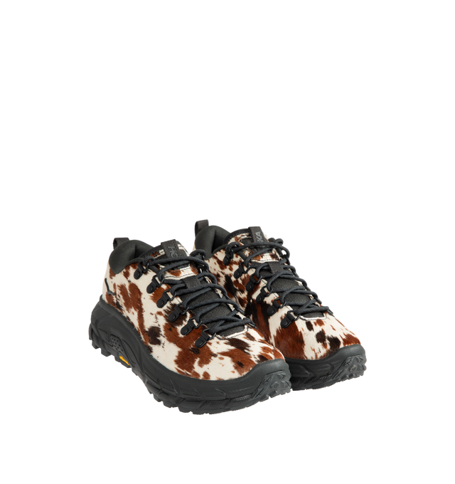 Image 2 of 5 - BROWN - HOKA  Tor Summit+ Pony Hair Sneaker featuring pony hair leather upper, metal eyelets + hiking-style lacing system, Vibram Megagrip outsole for traction on varied terrain, cushioned midsole for long-wear comfort, pull tabs at heel and tongue for easy entry and ;ow-cut hiking silhouette. 
