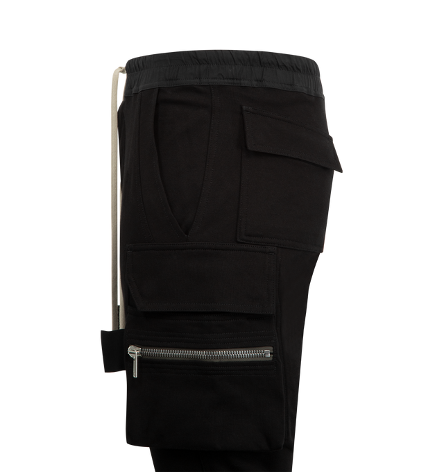 Image 3 of 3 - BLACK - RICK OWENS Mastodon Cargo Pants featuring slim-fit, drawstring at elasticized waistband, four-pocket styling, button fly, rib-knit cuffs and cargo and zip pockets at outseams. 100% organic cotton. Made in Italy. 