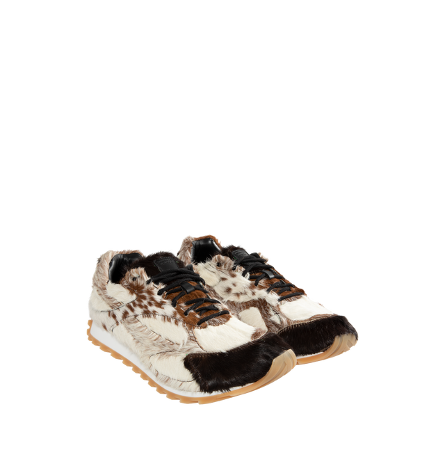 Image 2 of 5 - NEUTRAL - Bottega Veneta Orbit Goat Hair Sneakers are a lace-up style with goatskin hair for a unique patchwork effect, lambskin linings, and rubber soles. Made in Italy.  