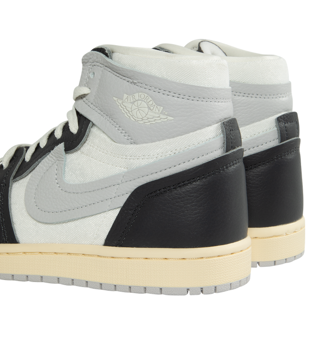 Image 3 of 5 - MULTI - AIR JORDAN 1 HIGH METHOD OF MAKE features a real and synthetic leather in upper, encapsulated Nike Air unit, rubber in the outsole, wings logo on collar, embroidered Swoosh logo and Jumpman on tongue. 