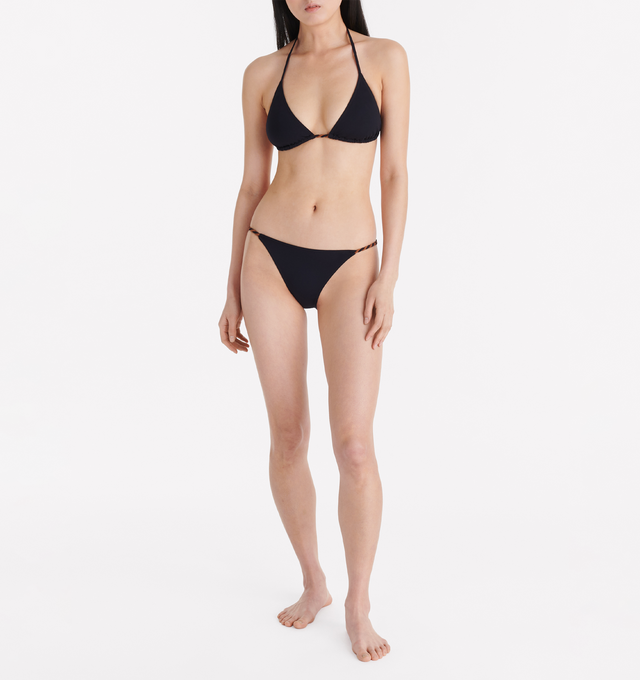 Image 3 of 6 - BLACK - ERES Toupie Small Sliding Triangle Bikini Top featuring small sliding triangle bikini top, two-tone twisted tie and halter tie spaghetti straps. 84% Polyamid, 16% Spandex. Made in Morocco. 