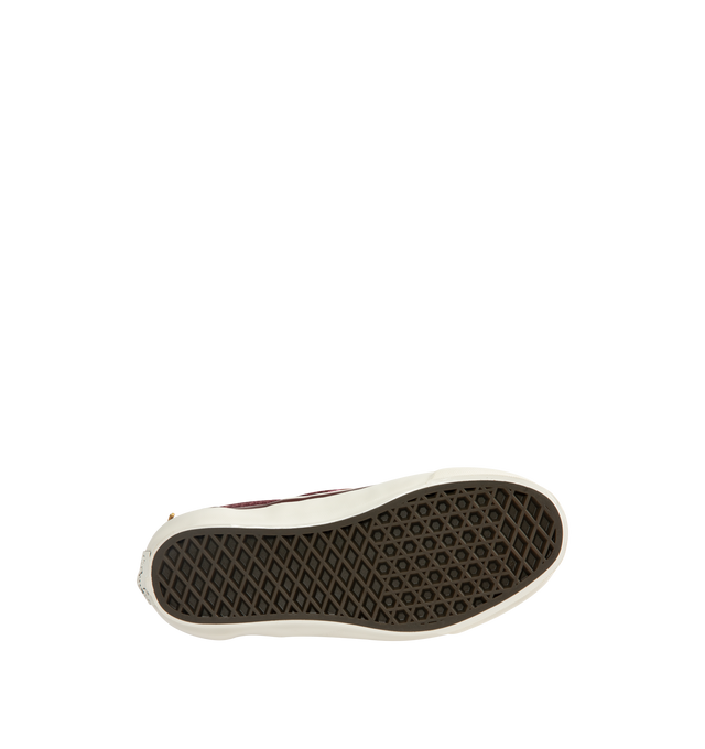 Image 4 of 5 - RED - Vans Unisex Premium LX Classic Slip-On 98 Cardigan Sneakers are crafted from multicolor knit cardigan textile and feature the brand's iconic laceless slip-on silhouette, decorative gold-tone hardware pins, and a padded collar for enhanced comfort. Main Material: Knit Textile; Hardware: Metal Pins; Outsole: Rubber. *Unisex style in men's sizing.   