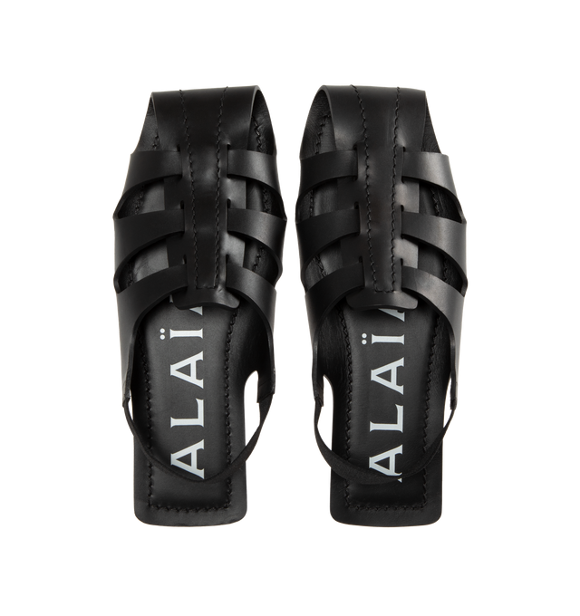 Image 4 of 4 - BLACK - ALAIA Folded Flat Calfskin Sandals featuring semi open flat sandals playing on folding work of leather and elastic strap behind the ankle. 100% calf leather. Made in Italy. 