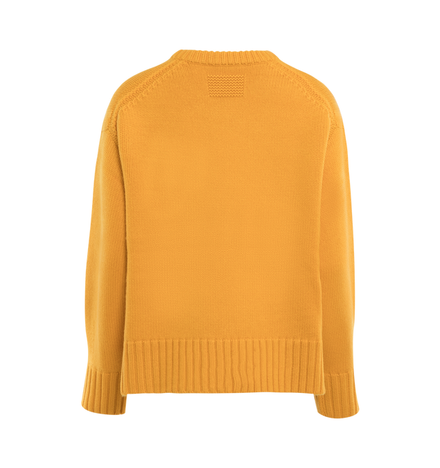 Image 2 of 3 - YELLOW - GUEST IN RESIDENCE Cozy Crew featuring oversized fit, crew neck, dropped shoulder, reverse jersey detail around arm & shoulder with tuck stitch, ribbed neck trim, cuff and hem, side slit at hem and jersey cable. 100% cashmere.  