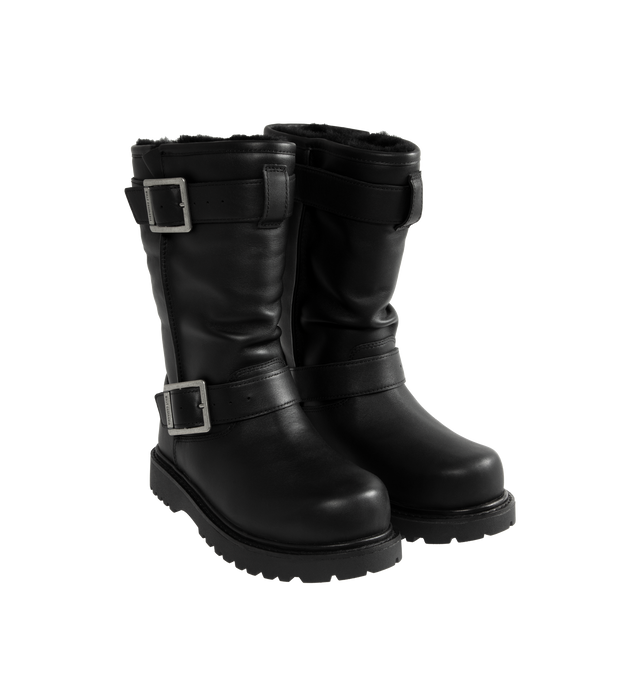 Image 2 of 4 - BLACK - UGG x Willy Chavarria Biker Boot is crafted from leather and reimagines UGG's iconic silhouette with a rugged, moto-inspired design. Featuring a mid-calf profile, chrome hardware detailing, and UGG's signature plush sheepskin lining, the boot combines bold utility styling with exceptional comfort. Main Material: Leather. Lining: Sheepskin. Unisex style in men's sizes. 