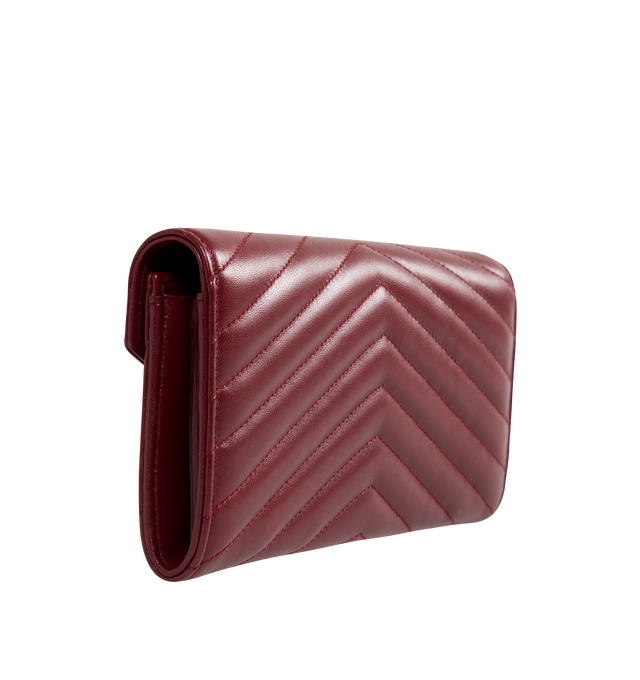 Image 2 of 3 - RED - SAINT LAURENT Large Flap Wallet featuring quilted overstitching, leather lining, snap button closure, twelve card slots, one coin pocket, two bill compartments and two receipt compartments. 7.5" X 4.3" X 1.2". 100% lambskin.   