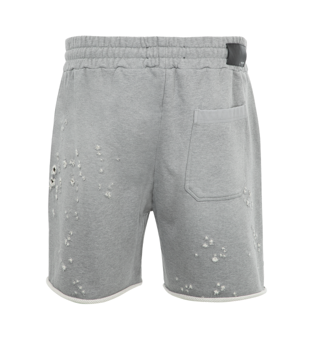 Image 2 of 3 - GREY - Amiri MA Shotgun Embroidered Shorts have an elastic drawstring waist, a distressed effect, raw edges, side zip pockets, a rear patch pocket, and an embroidered logo at the front.  