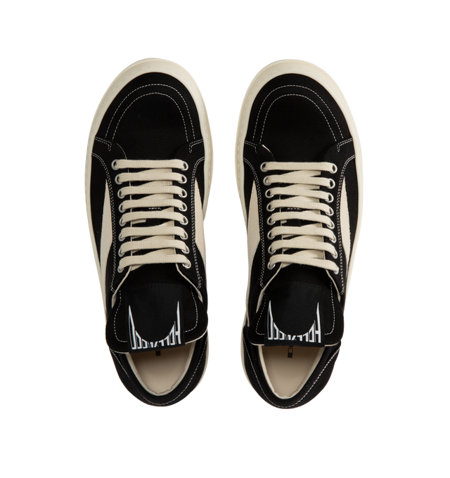 Image 5 of 5 - BLACK - Rick Owens DRKSHDW Vintage Denim Sneakers featuring low-top, lace-up closure, oversized tongue, treaded rubber sole and contrast stitching in white. Upper: cotton. Sole: rubber. Made in Italy. 