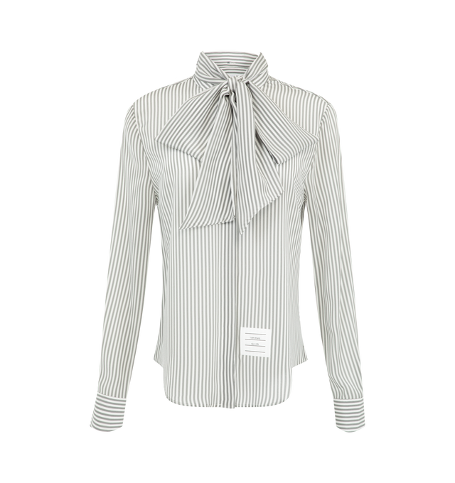 Image 1 of 3 - GREY - Thom Browne Womens Silk Shirt is crafted from fluid silk crpe de chine. Features a hidden button-front closure, band collar, detachable neck tie, buttoned cuffs, pleated back yoke with locker loop, curved hem, name tag appliqu, and signature striped grosgrain loop tab. Main Material: 100% Silk. Made in Italy. 