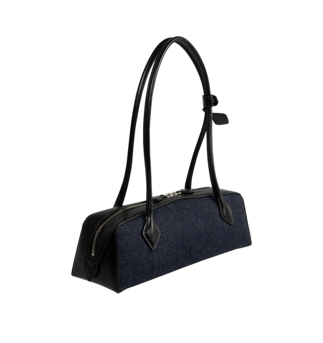 Image 2 of 3 - BLUE - ALAIA Le Teckel Medium Bag featuring an elongated silhouette, long tubular handles with decorative ties, double zip closure, small removable mirror on the inside pocket, Japanese raw denim and calfskin leather. L 33 X H 11 X D 10 cm. 100% cotton. 100% calfskin. Made in Italy.  