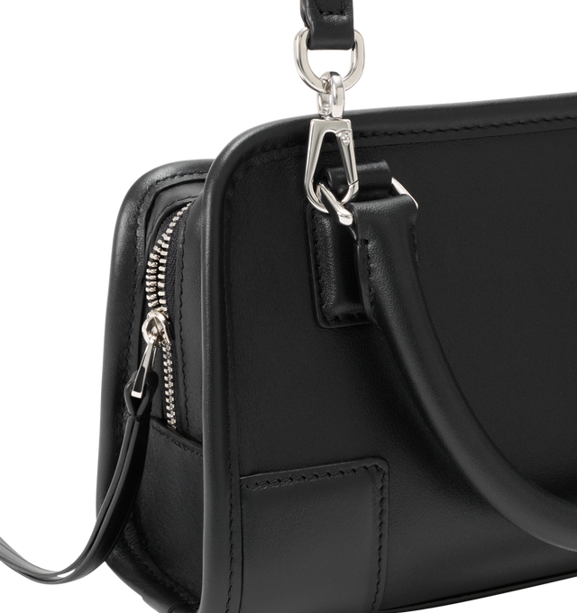 Image 11 of 11 - BLACK - LOEWE Mini Amazona 180 Bag in soft calfskin featuring two carry options: short handle, removable and adjustable crossbody strap, zip closure with two leather zip pullers, two compartments, main compartment closed with magnetic closure, left side d-ring for customization, suede lining, embossed LOEWE and embossed double L branding. Soft calfskin. 11.5 cm x 20 cm x 7 cm. Made in Spain. 