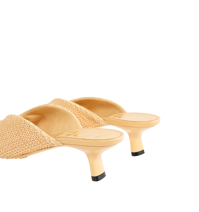 Image 3 of 4 - NEUTRAL - LOEWE PAULA'S IBIZA Pebble Soft slide in raffia-effect fabric featuring a raffia-effect upper, a metallic pebble with an Anagram engraved detail, petal toe shape, 45mm heel, engraved Anagram on pebble, padded leather insole and anagram embossed rubber outsole. Polyester effect raffia. Made in Italy. 