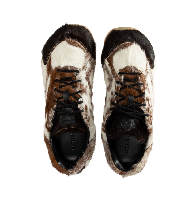 Image 5 of 5 - NEUTRAL - Bottega Veneta Orbit Goat Hair Sneakers are a lace-up style with goatskin hair for a unique patchwork effect, lambskin linings, and rubber soles. Made in Italy.  