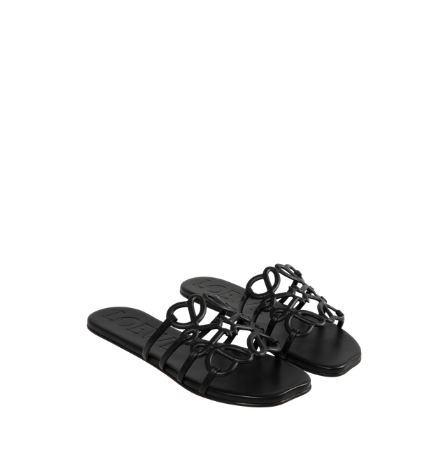 Image 2 of 4 - BLACK - Loewe Women's Slide in soft calfskin featuring a cut-out Anagram upper with hand-painted edges and hand-stitched seams, 5mm heel, embossed LOEWE on the insole, padded leather insole, rubber-injected island on the outsole. Calfskin leather. Made in Italy. 