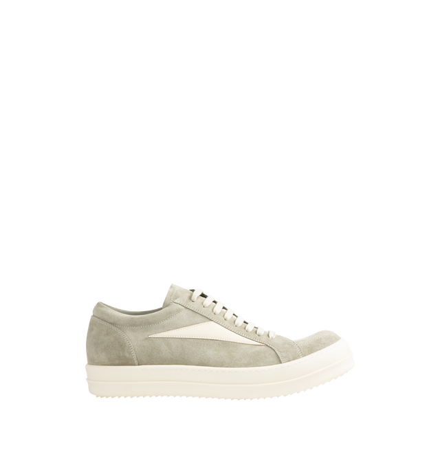 Image 1 of 5 - NEUTRAL - Rick Owens Mens Vintage Sneakers feature a full-grain calf leather and suede upper. Designed with an under-ankle silhouette, eight-eyelet lace-up closure, toe cap, resized triangular leather side appliqu, padded ankle, contrast stitching, and shark-tooth thermoplastic rubber outsole. Upper: 100% Cow Leather; Lateral Details: 100% Calf Leather; Lining: 100% Calf Leather; Insole: 100% Calf Leather; Outsole: 100% Thermoplastic Rubber. Sole Height: 3.5 cm. Made in Italy. 