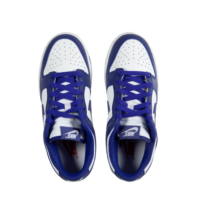Image 5 of 5 - PURPLE - Nike Dunk Low Sneakers with white and concord purple color-blocking,  a padded, low-cut collar, leather upper with a slight sheen and durability, foam midsole offering lightweight, responsive cushioning. Perforations on the toe add breathability. Rubber sole with classic hoops pivot circle provides durability and traction.  