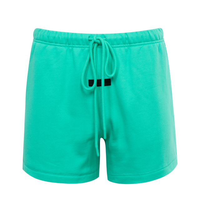 GREEN - FEAR OF GOD ESSENTIALS Running Shorts featuring rubber brand label, side hand pockets, elastic waistband, long drawstrings, cropped length and relaxed fit. 80% cotton, 20% polyester.