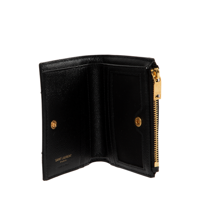 Image 3 of 3 - BLACK - SAINT LAURENT Bi Fold Wallet Card Holder featuring metal free tanned leather, decorated with interlocking cassandre, quilted overstitching gold-toned hardware, snap button fastening, one zippered coin purse, four card slots, one bill compartment and one transparent card slot. 4.1 x 3.3 x 0.9 inches. Calfskin. Made in Italy. 