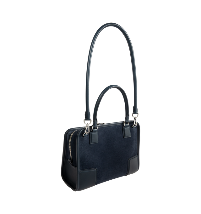 Image 3 of 5 - NAVY - LOEWE Small Amazona 180 Bag in suede featuring a relaxed silhouette anchored by a single toron top handle, designed to be carried open, while a concealed closure secures the main compartment, three carry options: short handle, removable shoulder strap and crossbody, zip closure with two leather zip pullers, two compartments, main compartment closed with magnetic closure, internal flat pocket, left side d-ring for customization, suede and nappa lambskin lining, embossed LOEWE and emboss 