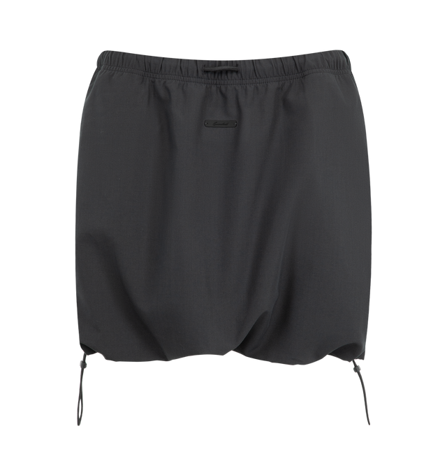 Image 1 of 3 - BLACK - The Fear Of God Essentials Women's Micro Skirt is crafted from a silk stretch blend for elevated comfort. This mini silhouette features an encased elastic waistband with bungee drawcords and adjustable toggles at the waist and hem. Materials: 69% Polyester, 19% Silk, 8% Wool, 4% Spandex. 