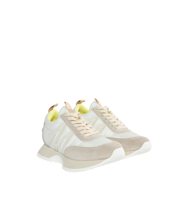 Image 2 of 5 - WHITE - MONCLER Pacey Low Top Sneakers featuring a bold logo and M-shaped accent, nylon technique and suede upper, mesh insole, lace closure, light TPU midsole and rubberized PU tread. 100% polyamide/nylon. Made in Italy. 