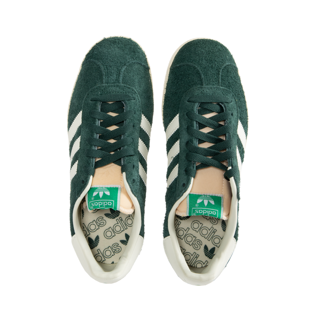 Image 5 of 5 - GREEN - Adidas Classic Suede Gazelle Sneakers are a lace-up style with satin uppers, suede and synthetic overlays, and gum outsoles. Textile linings.  