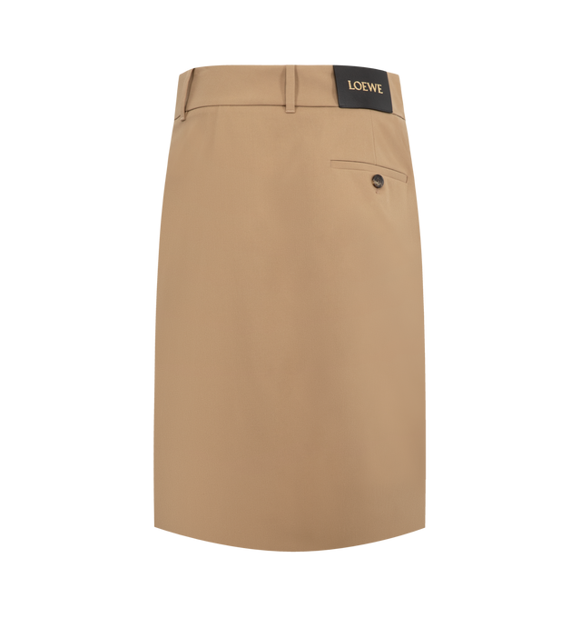 Image 2 of 3 - BROWN - LOEWE Wrap Skirt in lightweight compact cotton twill featuring an asymmetric construction with a wrap front, regular fit, mid length, mid waist, concealed hook fastening, seam pockets, buttoned rear welt pocket, pleats at the front and LOEWE embossed leather patch placed at the back. Cotton. Made in Italy. 