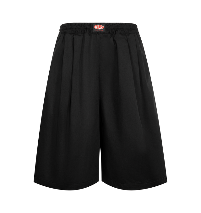 Image 1 of 3 - BLACK - Willy Chavarria Orale Elasticated Short is crafted from a polyester-cotton blend and features a relaxed, voluminous silhouette with an elasticated waistband for everyday comfort. Designed with the brand's signature oversized proportions and clean utility-inspired styling. Main Material: 65% Polyester, 35% Cotton. Lining: 100% Cotton. Made in USA. 