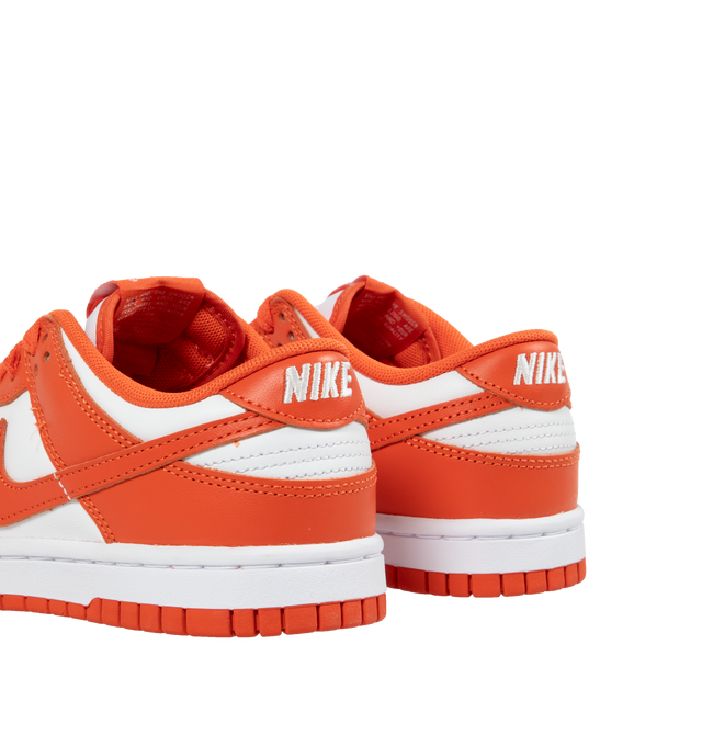 Image 3 of 5 - ORANGE - Nike Dunk Low Retro Sneakers are a lace-up style with a low-cut collar, premium leather uppers, foam midsoles, and toe perforations.  