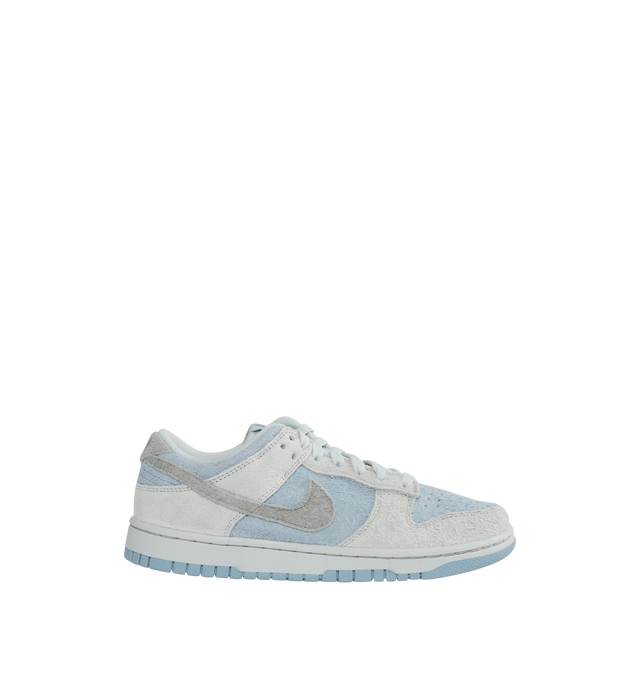 WHITE - NIKE Dunk low-top sneakers in a lace-up style crafted with a fuzzy textured suede leather upper, textile lining and rubber sole.