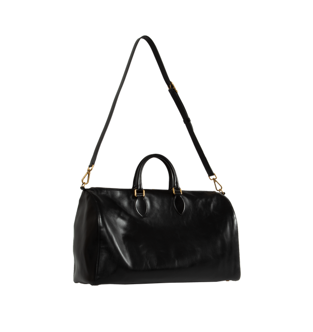 Image 2 of 3 - BLACK - KHAITE Pierre Weekender Bag featuring refined duffel with twinned top handles and gold hardware. Internal zip pocket. Includes lock, key, clochette, and adjustable shoulder strap. 18.11 in x 7.87 in x 10.63 in. 100% calfskin. 