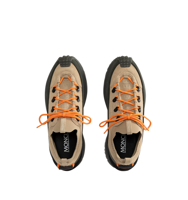 Image 5 of 5 - NEUTRAL - Moncler Mens Trailgrip Lite 3 Sneakers feature a nubuck, suede, and knit fabric upper. Designed with a knit sock construction, Ortholite insole, stretch fabric lining, lace-up closure, TPU sole with EVA filler, Vibram MEGAGRIP rubber outsole, carbon sole, 16 cm shaft height, and 4.2 cm sole. Upper: Cow Leather and 100% Polyester; Lining: 100% Polyester; Sole: 100% Elastodiene. Made in Vietnam. 
