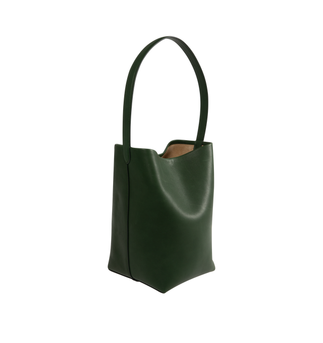 Image 2 of 3 - GREEN - THE ROW Park N/S Medium Tote Bag is crafted from supple leather and features a rounded shape, an interior toggle closure and top handle. 1" x 13" x 6". Leather. Made in Italy. 