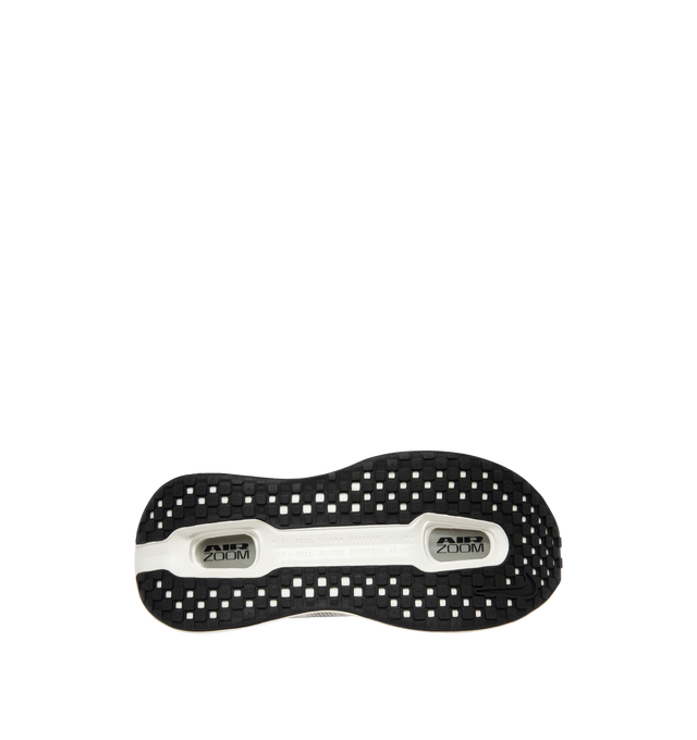 Image 4 of 5 - WHITE - Nike Women's Vomero Premium Running Shoes feature an engineered mesh upper for lightweight breathability and a secure fit. Designed for maximum cushioning, these performance running shoes combine a full-length ZoomX foam midsole with dual Air Zoom units at the forefoot and heel for exceptional comfort, responsive energy return, and a smooth ride. A durable Waffle rubber outsole provides reliable traction for everyday miles. Main Material: Mesh. Midsole: ZoomX Foam with Dual Air Zoom U 