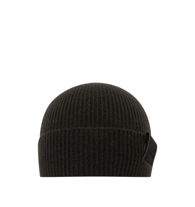 Image 1 of 2 - BROWN - Tom Ford Men's Ribbed Cashmere Beanie Hat is crafted from a soft cashmere ribbed knit and features a foldover cuff accented with a leather tab embossed with the signature TF monogram. This designer knit beanie combines timeless cold-weather styling with refined detailing for elevated everyday wear. Main Material: Ribbed Knit. Trim: Leather. Made in Italy. 