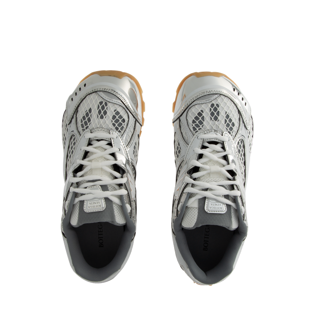 Image 5 of 5 - SILVER - BOTTEGA VENETA Sneakers featuring mechanical textile upper, rubber sole, lace-up front, padded collar and tongue with Bottega Venneta logo detail at tongue. Made in Italy. 