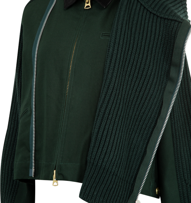 Image 4 of 4 - GREEN - Sacai x Carhartt WIP Women's Duck x Wool Knit Blouson is a hybrid of Carhartt WIPs Detroit Jacket and sacais knit blouson. Featuring two front layers on the body and sleeves, made from Carhartt WIPs duck canvas fabric, with rib-knit, spun wool and nylon yarn, an asymmetric front opening with a double zipper, and a high neck that can be worn up or down to form a flat collar, and co-branded woven label. A co-branded woven label appears on the front. Organic cotton canvas, Knit material  